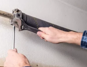 How Garage Door Springs Work and Why They're Dangerous