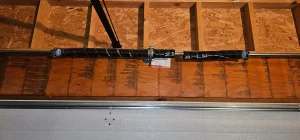 How Garage Door Springs Work and Why They're Dangerous
