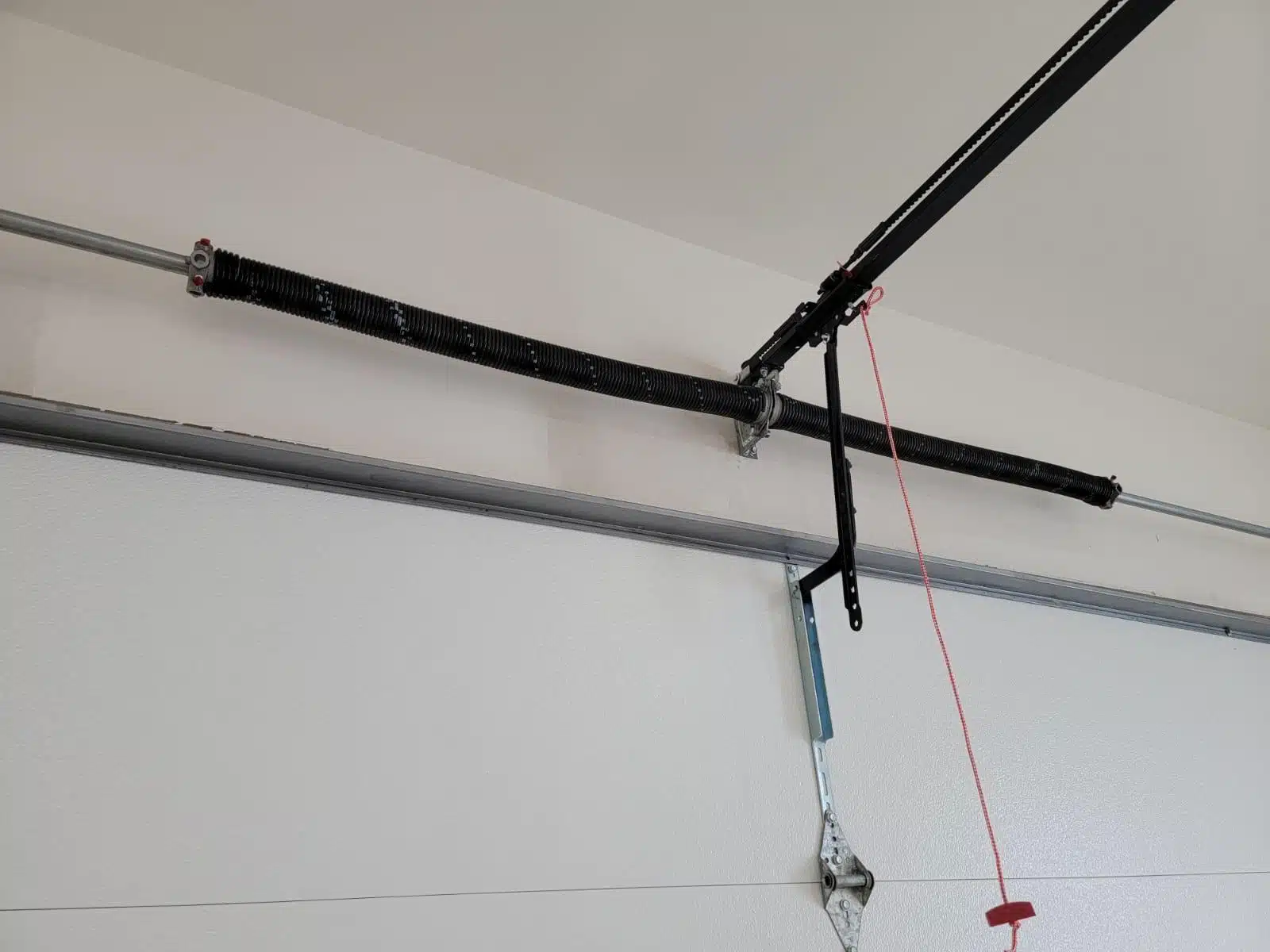 What Makes Torsion Springs More Dangerous Than Extension Springs